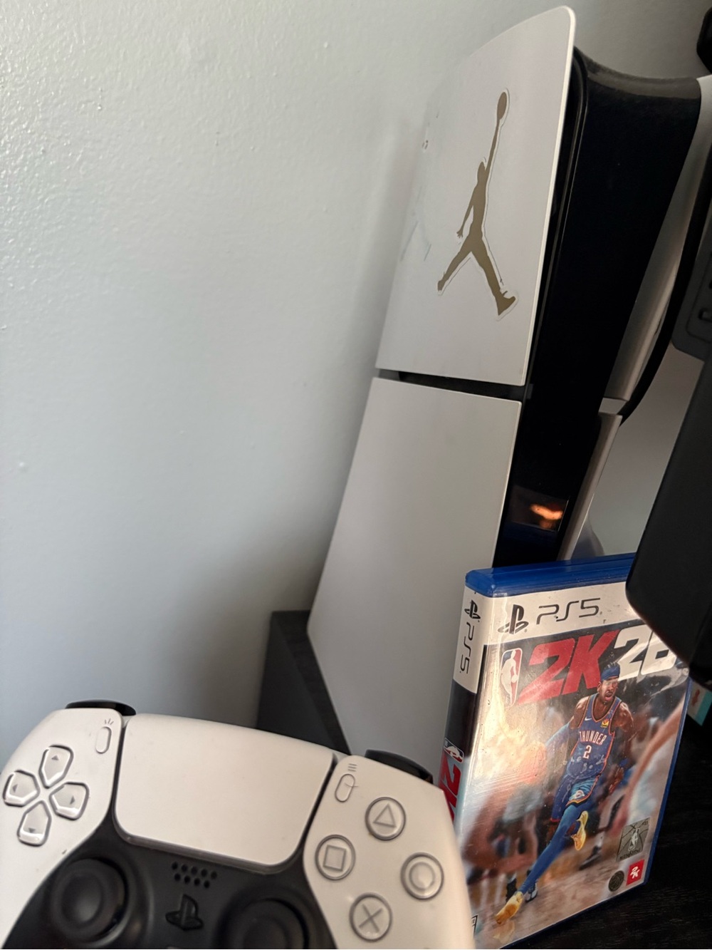 Sony PlayStation 5 Console with White DualSense and Blue-Accented Game Case